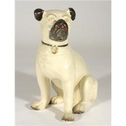 Hand painted seated pottery pug dog, 29cm high