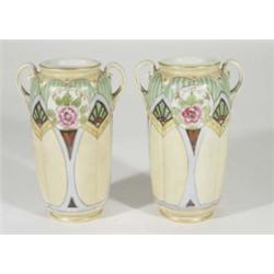 Pair of Art Deco Japanese porcelain vases, hand painted and gilded with flowers, marks to base, 20cm