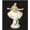 Hand painted German porcelain ballerina in a lacework dress, marks to base, 10cm high