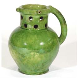 Green iridescent glazed pottery puzzle jug, 20cm high