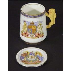 Paragon Edward VII Coronation commemorative cup and coaster decorated with a armorial crest with lio