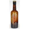 Brown glass Whitbread display bottle with cork stopper and paper label, 60cm high