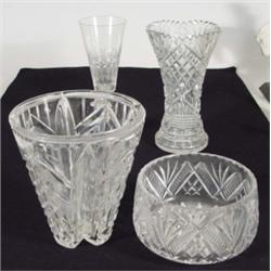 Art Deco style heavily cut glass vase, two other cut glass vases and a fruit bowl, largest 27cm high
