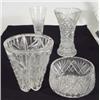 Art Deco style heavily cut glass vase, two other cut glass vases and a fruit bowl, largest 27cm high