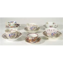 Six 19th century cups and saucers, decorated with lustre glazes and hand painted and transfer printe