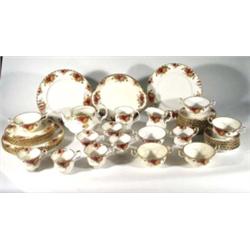 Large quantity of Royal Albert Country Rose pattern tea/ dinnerware, including teapot, cups, soup bo