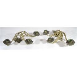 Pair of three branch gilt brass wall sconces, cast with leaves and berries