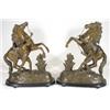 Image 1 : Pair of Victorian French spelter groups of young men on prancing horses on ebonised wooden bases, 44