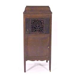 Freestanding mahogany cased Edison diamond disc player in a fretwork cabinet, 110cm high