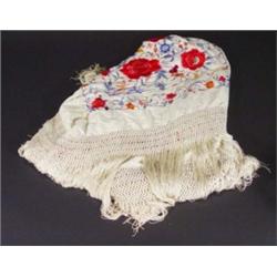 Rectangular Edwardian throw decorated with a geometric pattern onto a brown ground, approximatly 250