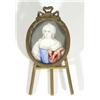 Brass framed miniature of a woman in a jewelled dress onto ivory, 9cm high
