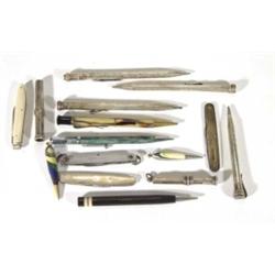 Group of silver and silver plated marbleised propelling pencils, etc