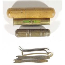 Miniature wooden cased brass spirit level and set of mail tools