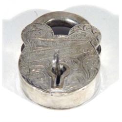 Silver plated chased candlestick inscribed 'Raj Bahadur Veterinary Dispensary, Shegaon', 10cm high