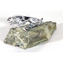 Chrome factory issue Jaguar mascot mounted on a stone base, 20cm in length