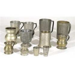 Selection of 19th and 20th century pewter measures and tankards with various marks, largest 1pt