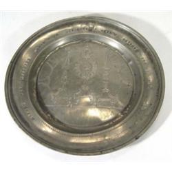 Early 19th century Dutch pewter wedding plate, chased with candlesticks and dated 17th May 1818, 40c