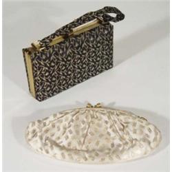 Two clutch bags, one with mirrored interior