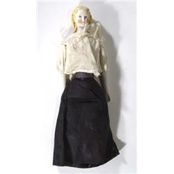 Victorian hand painted bisque headed and limbed doll in a black and lace dress. 36cm in length