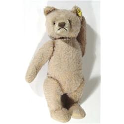 Old straw filled jointed teddy bear, 38cm high
