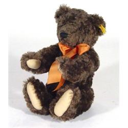 Steiff jointed teddy bear with squeaker and label to ear, 34cm high