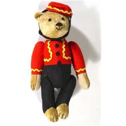 Jointed teddy bear in bellboy costume, 32cm high