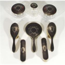 Silver, tortoiseshell and cut glass dressing table set, inlaid with swags, comprised two pots, a sce