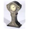 Art Nouveau silver faced and ebonised wooden mantelclock, embossed with stylised decoration with ena