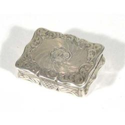 Victorian silver vinaigrette with chased decoration to exterior and gilt interior, maker's mark 'ES'