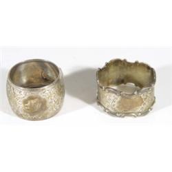 Two chased silver napkin rings