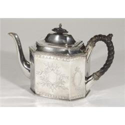 Victorian silver plated teapot, chased with flowers with a ropetwist wooden handle, 18cm high