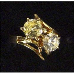 18ct gold ring set with a white diamond approximately 1+ct and a yellow diamond of approximately 1+c