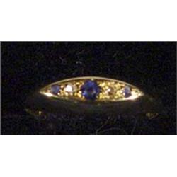 18ct gold diamond and bluestone ring