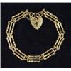 Image 1 : 9ct gold gate bracelet with heart shaped closer