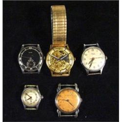 Five assorted gentlemen's wristwatches including a Vulcain mystery watch