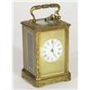 Image 1 : Victorian brass carriage clock with cut glass panels, chased with swags with enamel dial, 17cm high