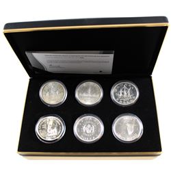 RCM Issue: 1935-1967 The Vintage Canadian Silver Dollar Collection in Black RCM Display Case. This S