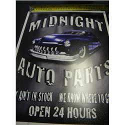 Midnight auto parts tin sign