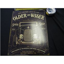 Older and wiser 30's rod tin sign