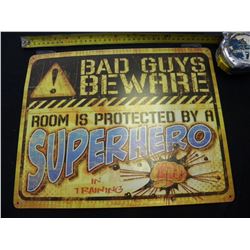 Bad Guy beware tin sign
