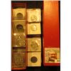 Image 1 : 9" x 2" x 2" Stock Box partially full of Statehood Quarters, maybe $10-15 face value.