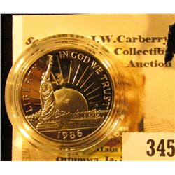 1986 S Proof Statue of Liberty Commemorative Half Dollar in a sealed cointain holder.