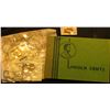Image 1 : Littleton Coin Company envelope with a group of approval coins. 2007 P Idaho Statehood Quarter BU; &