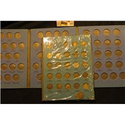 Empty used Jefferson Nickel Whitman folder; & a partial set of 1916 up Mercury Dimes in a blue Whitm
