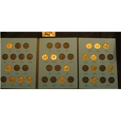 1965-87 Partial Set of clad Washington Quarters in a blue Whitman folder. ($4.25 face value).