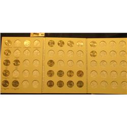 2009-2011 Partial Set of U.S. Territories Commemorative Quarters in a blue Whitman folder. (23 pcs.)