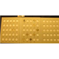 Partial Set of U.S. Roosevelt Dimes stored in a Harris Coin folder. Includes a 1954 P Proof Issue. (