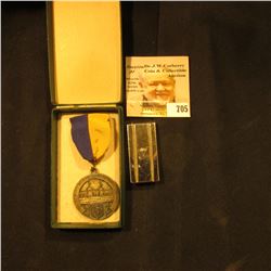 Sterling Silver Money Clip with 14K Gold Wire decoration, total weight about one ounce; and a Greens