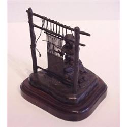 Juan Martinez (20th Century) American, RUG WEAVER, 1975, patinated cast bronze sculpture, numbe...