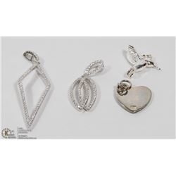 18) LOT OF 4 STERLING SILVER CZ PENDANTS